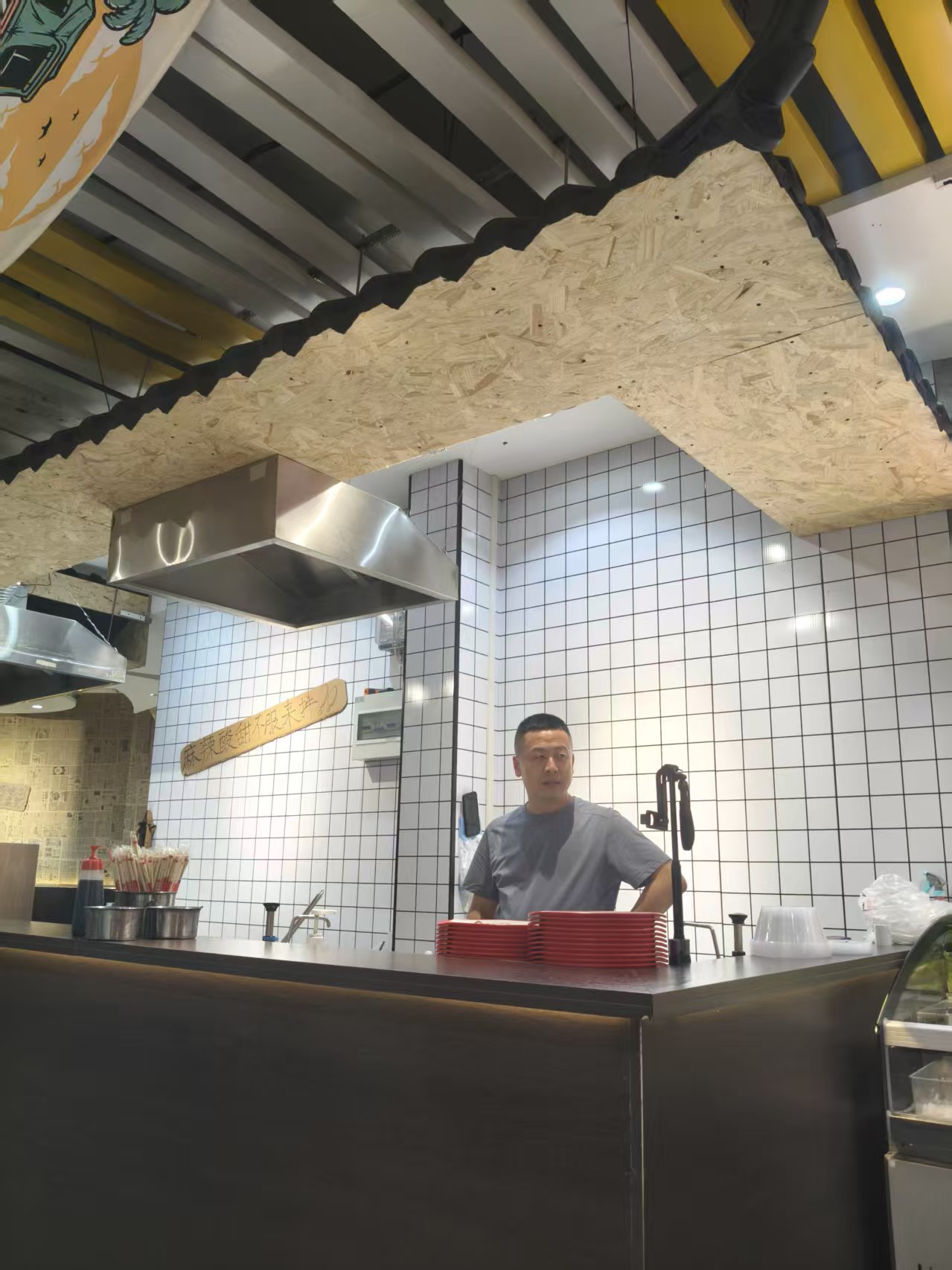 Owner behind the counter