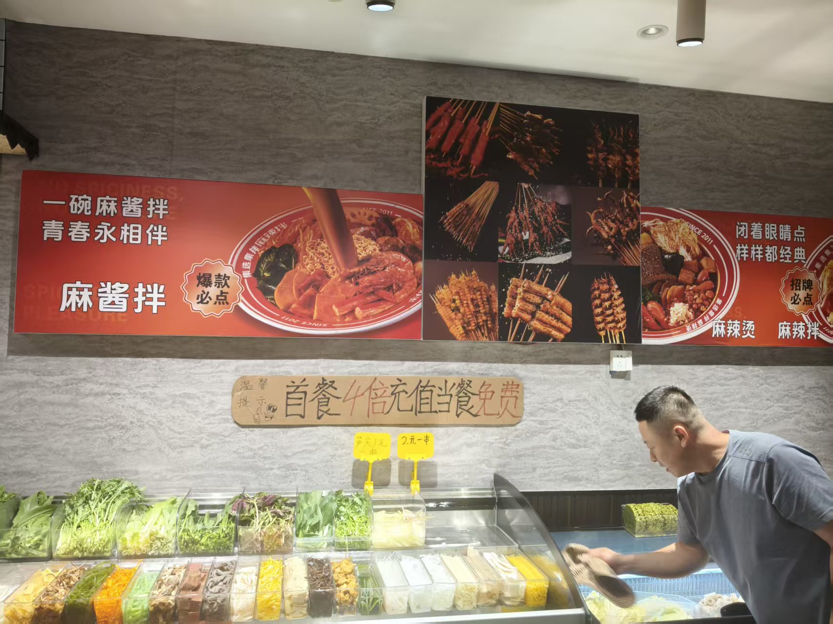 Owner preparing the ingredient counter